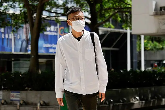 Patrick Lam, the former acting editor-in-chief of Hong Kong’s now shuttered pro-democracy news outlet Stand News, arrives at the District Court in Wan Chai, Hong Kong, ahead of a sentencing hearing for two former Stand News editors convicted of sedition