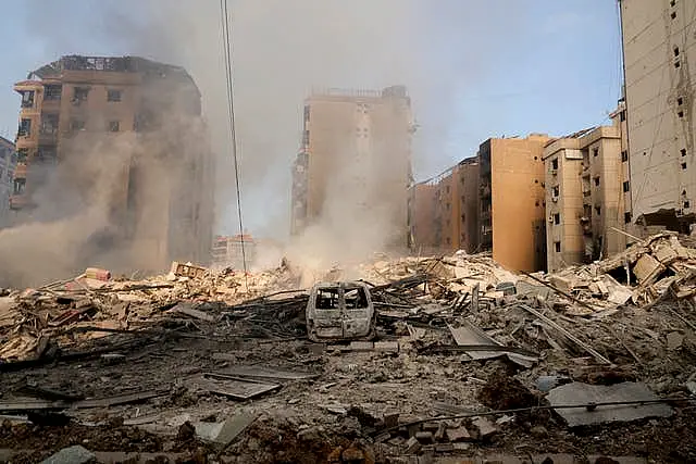 Smoke rises from destroyed buildings in Beirut’s southern suburbs on Saturday morning 