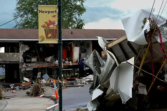 A flood-damaged building and debris left by Hurricane Helene is seen in Newport 