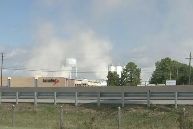 Smoke rises from the roof of a BioLab plant