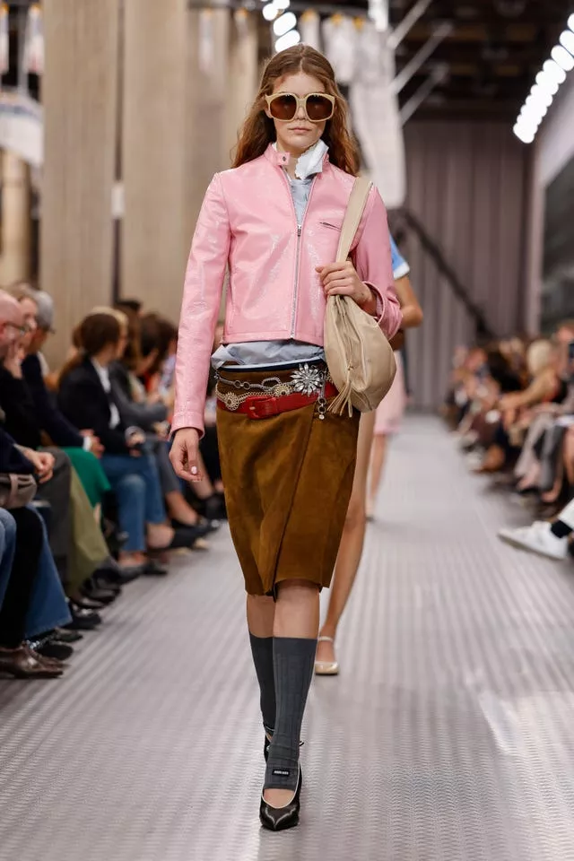 A model wears a creation as part of the Miu Miu Spring/Summer 2025 collection