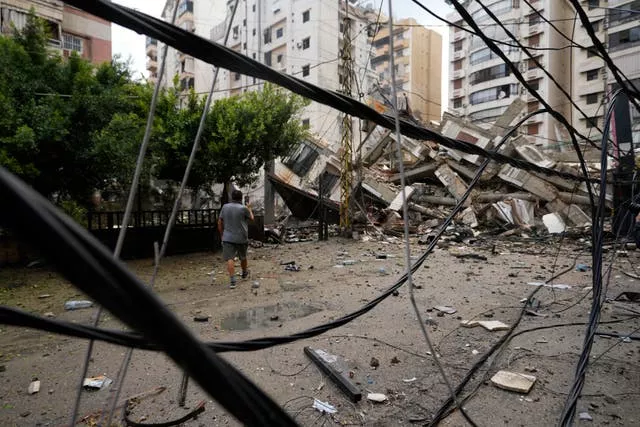 Damaged buildings at the site of an Israeli airstrike in Beirut’s southern suburb