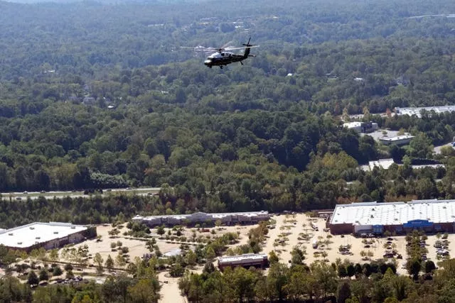 Marine One, with President Joe Biden on board, flies over areas impacted by Hurricane Helene