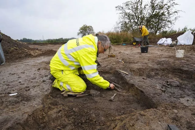 Kirsten Prangsgaard, archaeologist at Museum Odense, works at an excavation site