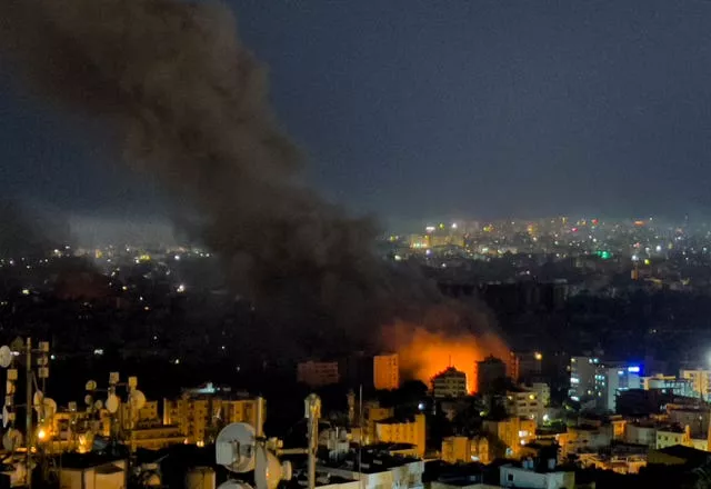 Flames and smoke rise from Israeli air strikes in Dahiyeh, Beirut, Lebanon