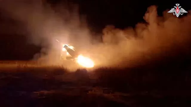 A Grad self-propelled 122mm multiple rocket launcher fires rockets toward Ukrainian positions