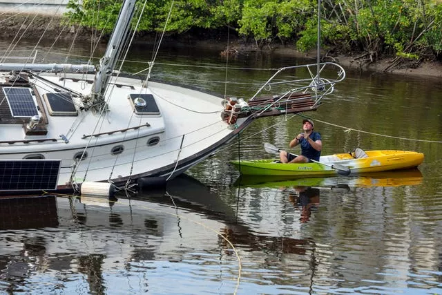 A man secures his boat