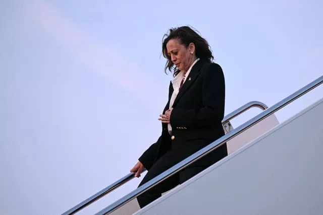 Harris steps off Air Force Two upon return to Joint Base Andrews in Maryland