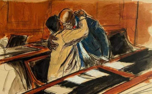 Court sketch shows Diddy hugging a defence lawyer