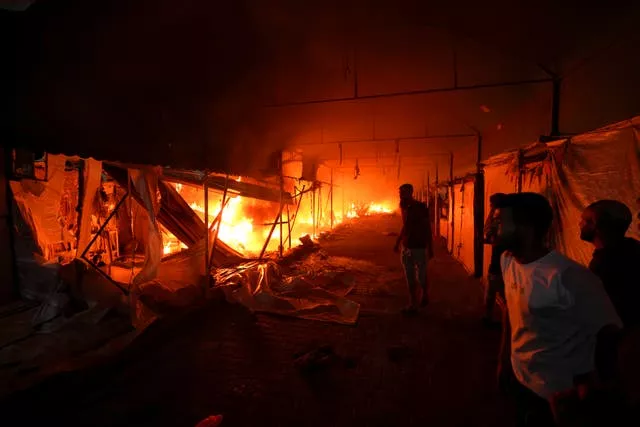 A burning tent camp in Gaza