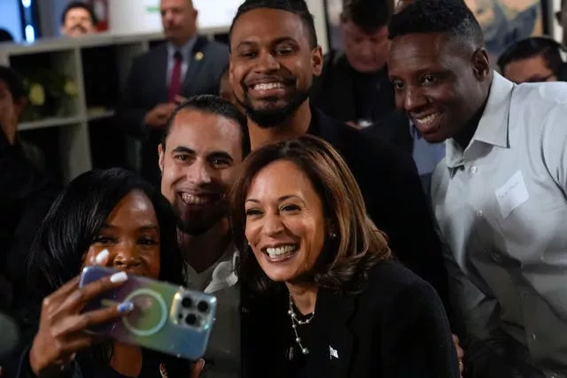 Kamala Harris poses for a photo