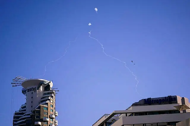 Smoke in the sky as a missile is intercepted in Tel Aviv