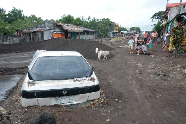 Car buried in mud