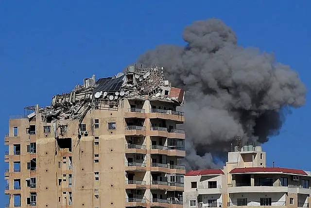 Smoke rises from a building