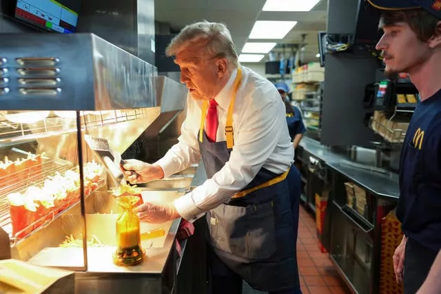 Donald Trump serves fries 