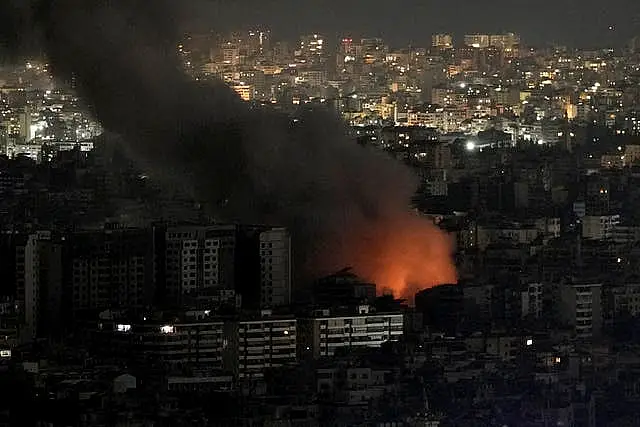 Flames and smoke rise form an Israeli airstrike on Dahiyeh, in the southern suburb of Beirut