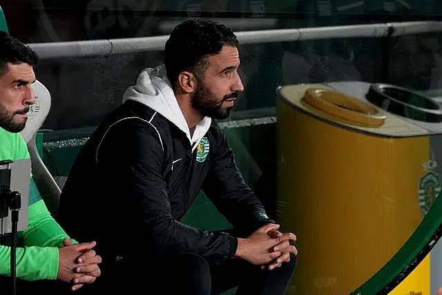 Sporting boss Ruben Amorim sits in the dugout