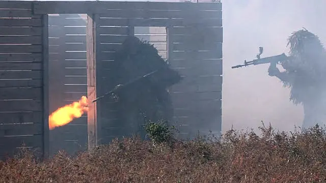 Russian soldiers attend combat training for assault units at an undisclosed location in Ukraine