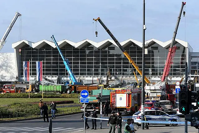 People at the scene of the roof collapse 