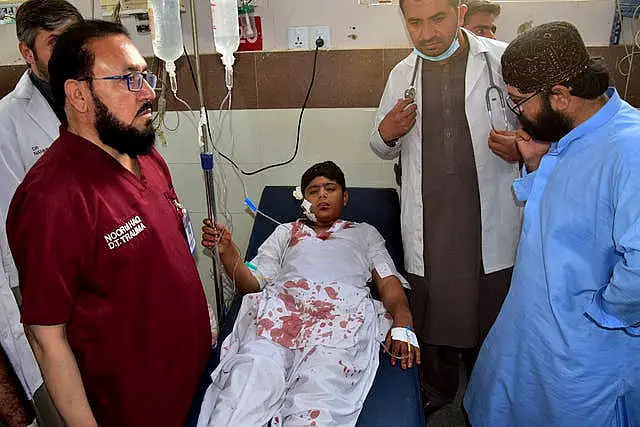 A boy on a hospital bed