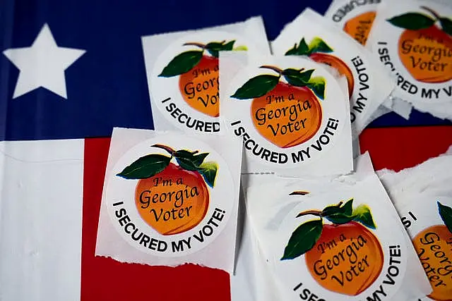 Stickers sit on a table inside a polling place in Atlanta 