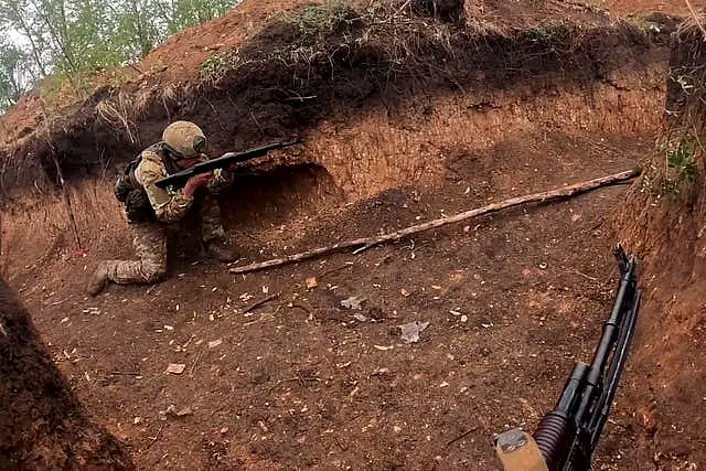 Russian servicemen take part in a combat training for assault units at an undisclosed location in Ukraine