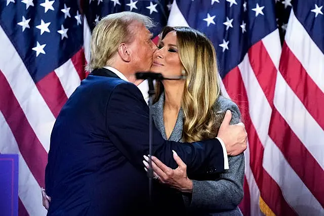 Donald and Melania Trump embracing