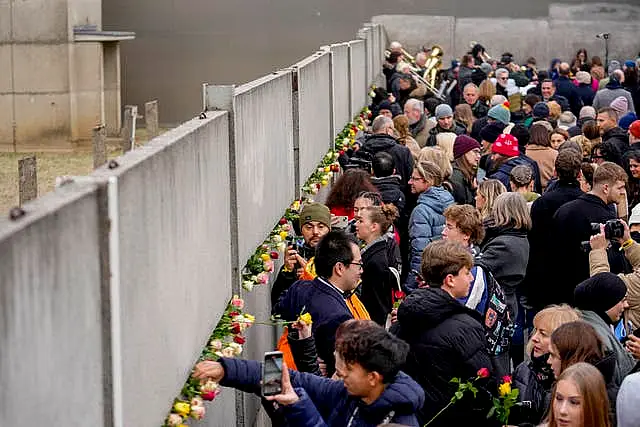 People at the remnants of the Wall