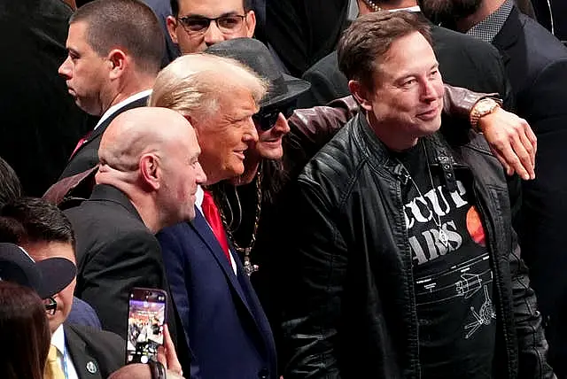 Donald Trump poses for a photo with Dana White, Kid Rock and Elon Musk