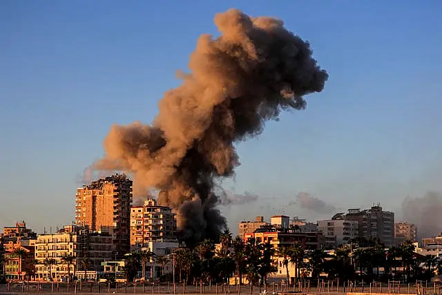 Smoke rises from a building hit in an Israeli air strike on southern Lebanon