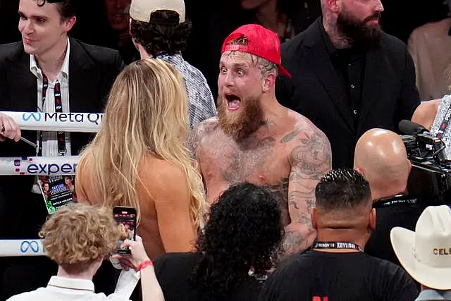 Jake Paul reacts after defeating Mike Tyson