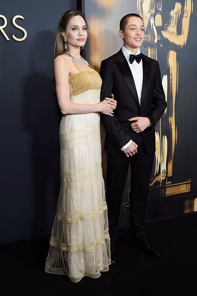 Angelina Jolie, left, and Knox Leon Jolie-Pitt arrive at the 15th Governors Awards on Sunday, Nov. 17, 2024, at The Ray Dolby Ballroom in Los Angeles.