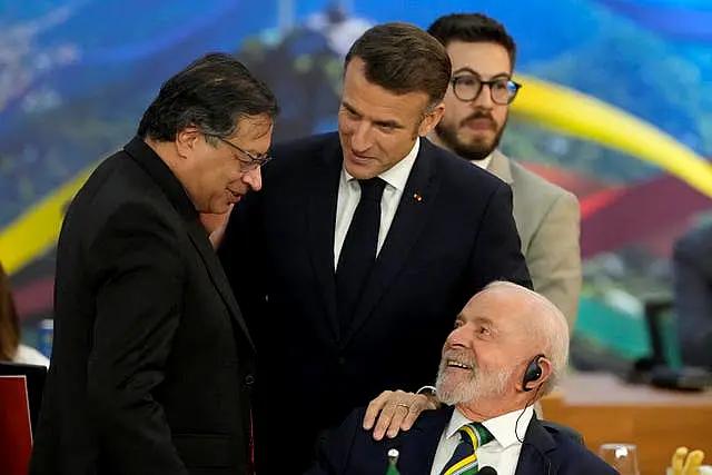 Brazil's President Luiz Inacio Lula da Silva, bottom right, talks with France’s President Emmanuel Macron, centre, and Bolivia’s President Luis Arce during the G20 Summit in Rio de Janeiro 