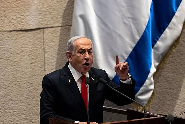 Benjamin Netanyahu gestures as he speaks 