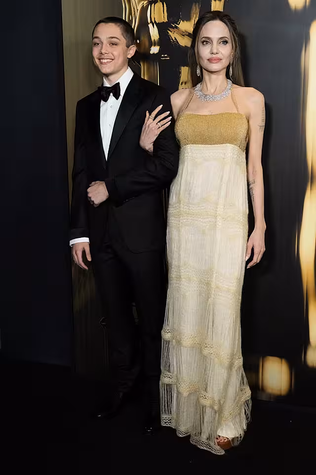 Angelina Jolie and her son smile on red carpet 15th Governors Awards