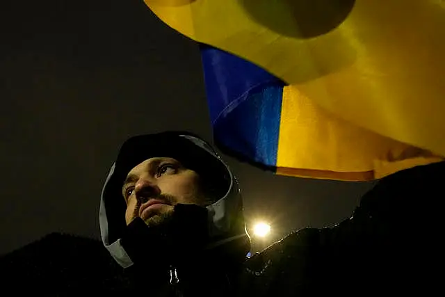 Protesters in Poland with Ukrainian colours