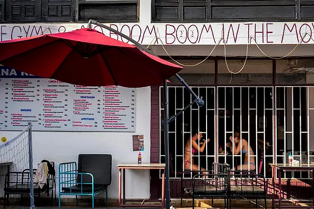 People eat at the Nana Backpack hostel