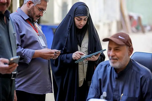 Workers prepare to collect information from the public 