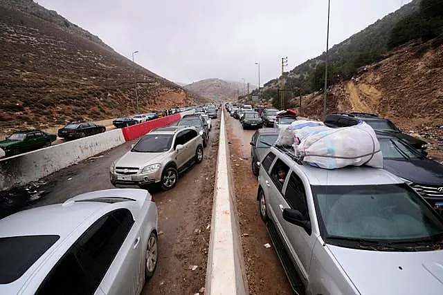 Displaced residents return from Syria in cars following a ceasefire between Israel and Hezbollah