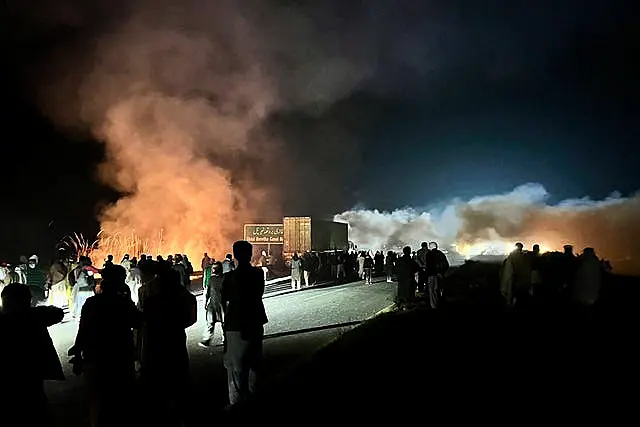 Smoke rises at a protest