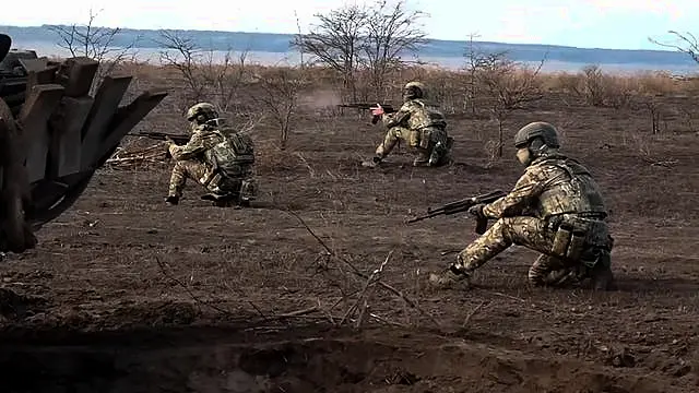 Russian servicemen attend a combat training for assault units in an undisclosed location