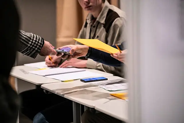 People cast their ballot in the Iceland election