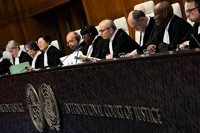 Presiding Judge Nawaf Salam, fourth from right, opens hearings