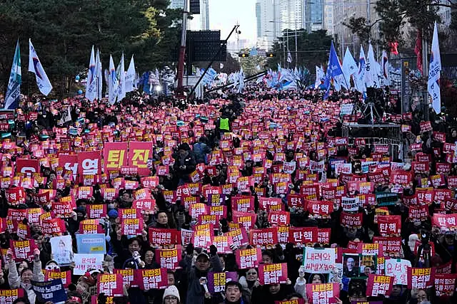 Protesters stage a rally demanding South Korean President Yoon Suk Yeol’s impeachment