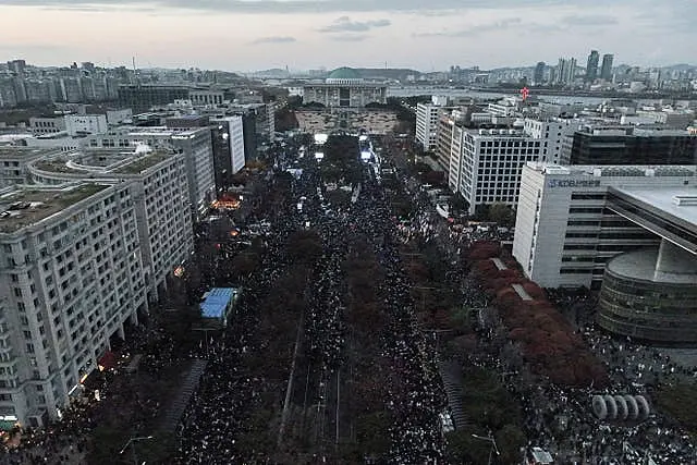 Protesters stage a rally demanding South Korean President Yoon Suk Yeol’s impeachment