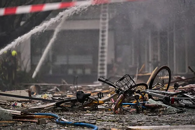 Debris including destroyed bikes on the ground