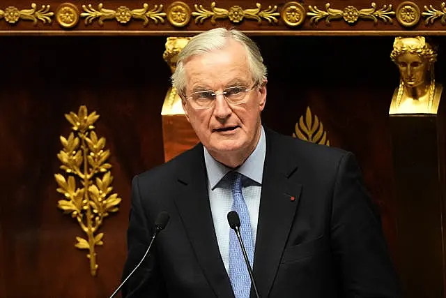 Michel Barnier addressing the National Assembly