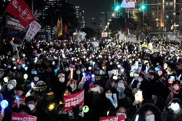 A rally demanding South Korean President Yoon Suk Yeol’s impeachment, outside the National Assembly in Seoul