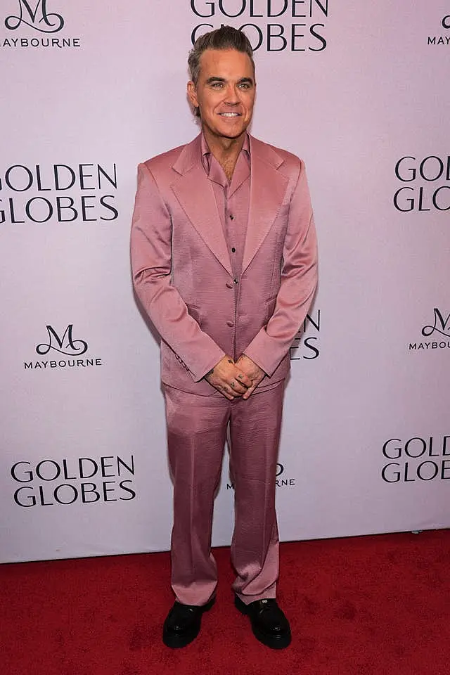 Robbie Williams arrives at the Golden Globes first-time nominee celebration