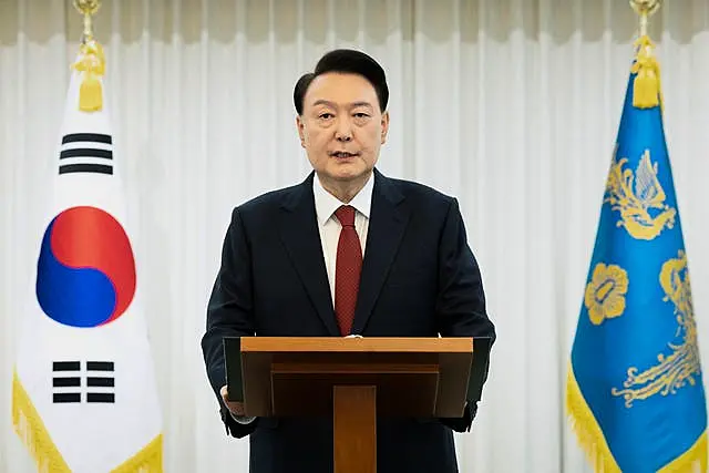 South Korean President Yoon Suk Yeol speaks at the presidential residence in Seoul